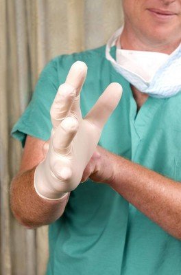 Pair of beige latex gloves